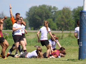 Regi's Charlee Robinson scores a try in a 15-12 win over Stouffville in a first-round game at the OFSAA triple-A girls rugby championship in Ottawa on Monday. (OFSAA photo)