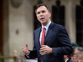 Finance Minister Bill Morneau responds to a question during Question Period in the House of Commons, Monday, May 30, 2016 in Ottawa. THE CANADIAN PRESS/Adrian Wyld