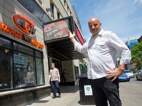 London Music Hall owner Mike Manuel stands outside of the A&W fast food restaurant opening up attached to the Dundas Street entertainment venue this weekend, in London on Monday. Patrons of the venue will be able to order and pay for food using a point of sale machine inside the venue, with food being delivered to customers through a pickup window.  (CRAIG GLOVER, The London Free Press)