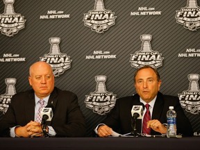 NHL Commissioner Gary Bettman speaks with the media during a press conference as NHL Deputy Commissioner and chief legal officer Bill Daly looks on prior to Game One of the 2016 NHL Stanley Cup Final. (Justin K. Aller/Getty Images/AFP)