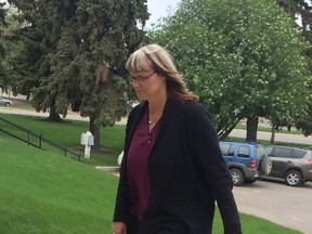 Angela Nicholson arrives at court in Prince Albert, Sask., Tuesday, May 24, 2016. Nicholson and Curtis Vey are accused of plotting to kill their spouses. Police believe the two accused were having an extramarital affair.THE CANADIAN PRESS/Jennifer Graham