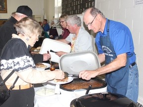 Brian Cocks of the Rotary Club was one of the many people who served food at the Beef, Beans and Beer Night at the Melfort Legion Hall on May 28.
