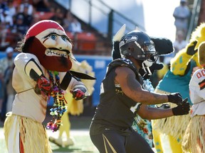Team Irvin defensive end Michael Bennett of the Seattle Seahawks dances with mascots during the 2016 Pro Bowl at Aloha Stadium in Honolulu on Jan. 31, 2016. (Kirby Lee/USA TODAY Sports)