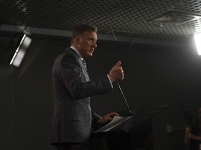 Conservative leadership candidate Maxime Bernier speaks during a new conference on supply management in Ottawa, Tuesday, May 31, 2016. THE CANADIAN PRESS/Adrian Wyld