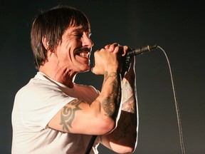 Anthony Kiedis of the Red Hot Chili Peppers performs at The Theatre at Ace Hotel on Friday, Feb. 5, 2016, in Los Angeles. (Photo by Rich Fury/Invision/AP)