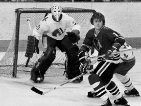 Chicago Blackhawks' Tom Lysiak in action against Quebec Nordiques' goalie Michel Dion, during first period NHL action in Quebec City, Wednesday, March 26, 1980. (THE CANADIAN PRESS/Jacques Nadeau)