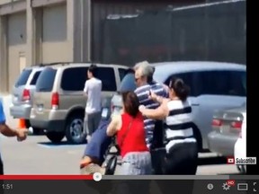 Amateur video posted to YouTube shows a brawl in the parking lot of a Mississauga Costco (YOUTUBE).