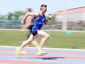Lucas Mrozewski practices his sprinting in preparation for OFSAA at the Laurentian University Community Track in Sudbury, Ont. on Tuesday May 31, 2016. Gino Donato/Sudbury Star/Postmedia Network