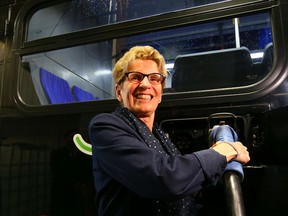 Ontario Premier Kathleen Wynne is pictured in April when she announced $10 million for the Canadian Urban Transit research and Innovation Consortium to create electric powered buses in Brampton. (DAVE ABEL, Toronto Sun)