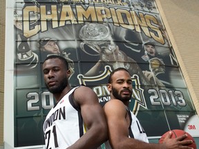 London Lightning basketball players Stephen Maxwell, left, and Akeem Scott hope their squad will be the second London sports team within two weeks to deliver a championship trophy to town as they head to Halifax to take on the Halifax Hurricanes in the NBL Canada championship series on Thursday.  The pair are pictured here outside their home arena, Budweiser Gardens, in London, Ont. on Tuesday. (CRAIG GLOVER, The London Free Press)