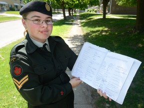 Patricia O'Doherty wore her cadet uniform to a meeting she had with London Mayor Matt Brown to show him a petition she is preparing asking for the removal of a ban on chalk drawings in her Bridalpath neighbourhood. (MORRIS LAMONT, The London Free Press)
