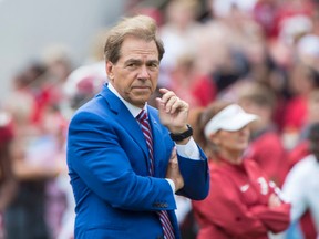 Alabama head coach Nick Saban watches his players warm up for a spring NCAA college football game, Saturday, April 16, 2016, at Bryant-Denny Stadium in Tuscaloosa, Ala. (Vasha Hunt/AL.com via AP) MAGS OUT; MANDATORY CREDIT