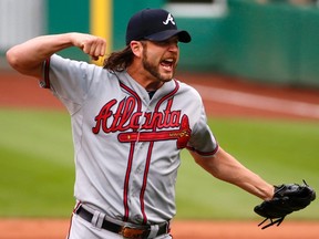 Jason Grilli celebrates getting a final out while with the Atlanta Braves. The reliever was acquired by the Blue Jays yesterday. (The Associated Press)
