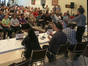 More than 250 people showed up Tuesday evening to hear the City of Ottawa's consultation session on the Mooney's Bay Park Playground. The playground is to be Canada's largest and will be featured in a TVO reality show while it's being built for Canada's 150th birthday in 2017. Julie Oliver/Postmedia