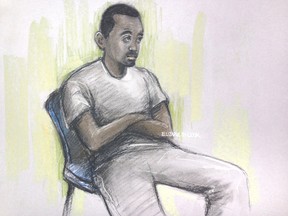 This is a sketch by court artist sketch by Elizabeth Cook, of Muhaydin Mire appearing at Westminster Magistrates' Court, London Monday Dec. 7, 2015 . Mire who allegedly screamed "this is for Syria" as he slashed a passenger’s throat in a London subway station on Saturday night  appeared in court Monday charged with attempted murder.  (Elizabeth Cook/PA via AP)