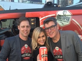 Greg and Jennifer Valentyne, and Murray Milthorpe, right, toast the launch of Southpaw's HEROES Blonde Lager. (Supplied photo)