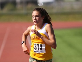 Brogan MacDougall of Regiopolis-Notre Dame wins the junior girls 1,500 metres race at the Kingston Area Secondary Schools Athletic Association track and field championships at CaraCo Field on May 11. (Elliot Ferguson/The Whig-Standard)