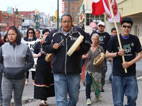 Walkers participate in the Attawapiskat First Nation Walk for Awareness in Sudbury, Ont. on Saturday May 28, 2016. John Lappa/Sudbury Star/Postmedia Network