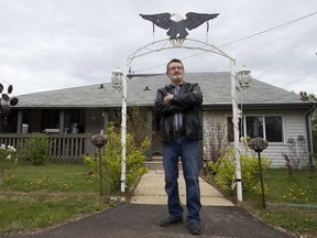 Chief Ron Kreutzer stands outside his home on the Fort McMurray First Nation on Wednesday, June 1, 2016. David Bloom photo