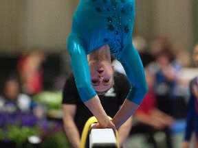 Ellie Black of Team Nova Scotia on the balance beam during pre-competition warm-up at the U of A Wednesday. (Dan Riedlhuber)