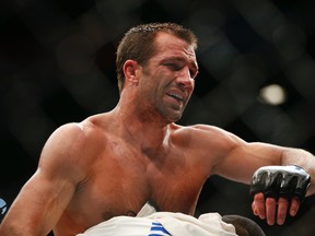 Luke Rockhold reacts after defeating Chris Weidman in a middleweight championship bout at UFC 194 in Las Vegas on Dec. 12, 2015. Rockhold takes on Michael Bisping at UFC 199 in Los Angeles on June 4. (John Locher/AP Photo)