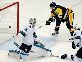 Penguins' Phil Kessel (81) scores a goal behind Sharks goalie Martin Jones (31) during the second period in Game 2 of the Stanley Cup Final in Pittsburgh on Wednesday, June 1, 2016. (Gene J. Puskar/AP Photo)