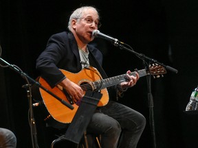 In this Oct. 6, 2015 file photo, Paul Simon participates in the Country Music Hall of Fame benefit concert in New York.  (Photo by Evan Agostini/Invision/AP, File)