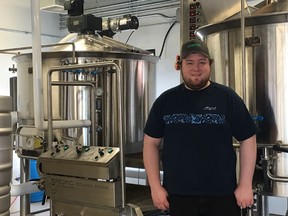 Brewer Matthew Cockle stands inside the just-opened brewery of Situation Brewing, a microbrewery and pub in downtown Edmonton.