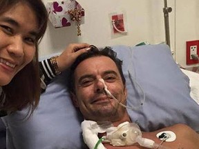While David Connelly recovers in a Thai hospital after a horrific scooter accident, his new love Mai Denwittayanan has barely left his side. (Submitted photo)