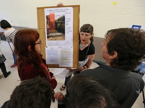 Abigail Mickelthwate expresses her opposition to a proposed cell tower on Niagara Street during an MTS open house at the Corydon Community Centre's River Heights location on Wed., June 1, 2016.