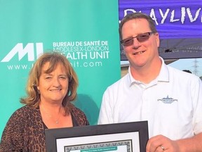 Mayor Joanne Vanderheyden and Rob Lilbourne, head of the recreations department for Strathroy-Caradoc, received the award on behalf of the municipality during a ceremony on Tuesday, May 31, at the St. Julien Park in London. Photo taken from the municipality's Facebook page.