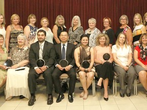 Bridging Excellence Awards recipients (front row, left to right) Madeleine Kerr, Rev. C. Joyce Hodgson, Dr. Youssef Almalki, Harry Rianto, Gayathri Radhakrishnan, and the members of the Best Practice Spotlight Organization Planning Committee (also in back row), pose for a photo. (Handout)