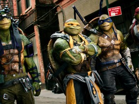 This image released by Paramount Pictures shows, from left, Donatello, Michelangelo, Leonardo and Raphael in a scene from "Teenage Mutant Ninja Turtles: Out of the Shadows." (Lula Carvalho/Paramount Pictures)
