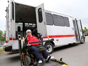 Emily Mountney-Lessard/The Intelligencer
Belleville woman Karen Kitchen is pictured with one of the city's three new mobility buses.