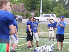 Sudbury Gladiators head coach Aaron Rehel runs through some strategy during team practice  in Sudbury, Ont. on Wednesday June 1, 2016. Gino Donato/Sudbury Star/Postmedia Network