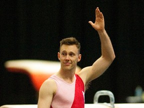 Jason Burnett of Team Ontario waves to well wishers prior to trampoline competition during the 2016 Canadian Gymnastics Championships at the U of A in Edmonton on Thursday.  (Dan Riedlhuber)