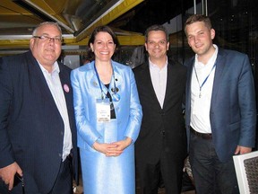 The newly-elected Conservative Party National Council members for Ontario, former Elgin-Middlesex-London MP Joe Preston, left, Kara Johnson, Matthew John and Matthijs van Gaalen, pose for a photo over the weekend at the party's convention in Vancouver.