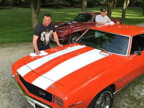 Submitted photo
Matt Miller and his father Pete polish Matt’s 1969 Camaro in preparation for the Enbridge car show, to be held Saturday, Sept. 17, in support of the United Way of Sarnia-Lambton. Matt, an employee of Enbridge, and his father, an Enbridge retiree, will enter both cars, including Pete’s 1967 Corvette. Those interested in registering a car, or need more information can contact Matt Miller at matt.miller@enbridge.com, or call 519-490-4893.