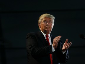 Republican presidential candidate Donald Trump applauds during a rally, Thursday, June 2, 2016, in San Jose, Calif. (AP Photo/Jae C. Hong)