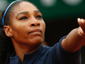 Serena Williams serves during the French Open semifinal against Kiki Bertens at the Roland Garros stadium in Paris, France, Friday, June 3, 2016. (AP Photo/Alastair Grant)