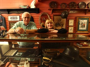 Peter and Liz Paget pose in their new store called Paget's Place.(Shaun Gregory/Huron Expositor)