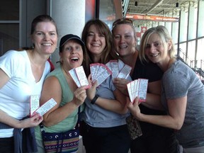 Score! From left, Janine Iley, Karen Lowe, Tracy Gauthier, Susie Lynch and Denise Garvin got tickets to the Tragically Hip concert at the Canadian Tire Centre this summer by standing in line at the box office Friday morning.