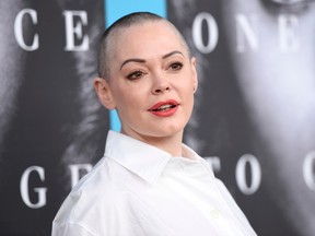 Rose McGowan arrives at the Los Angeles premiere of "Confirmation" at the Paramount Theatre on Thursday, March 31, 2016. (Photo by Chris Pizzello/Invision/AP)