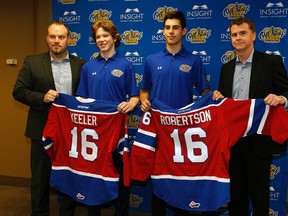 Edmonton Oil Kings Head Coach Steve Hamilton (left) and Edmonton Oil Kings General Manager Randy Hansch (right) welcome the team's two first round draft picks Liam Keeler and Matthew Robertson in Edmonton on May 16, 2016.