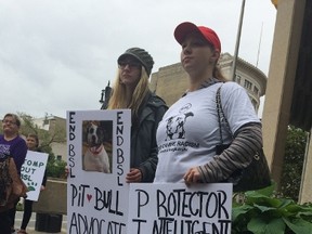 About 50 dog owners gathered at Winnipeg's City Hall on Friday to protest the city's breed-specific legislation they say is prejudicial to pit bulls. (DAVID LARKINS/WINNIPEG SUN)