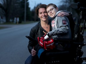Along with his mom, Tina Boileau, "Butterfly Boy" Jonathan Pitre.