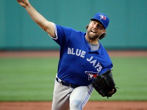 Blue Jays starting pitcher R.A. Dickey delivers to the Red Sox in the first inning at Fenway Park in Boston on Friday, June 3, 2016. (Elise Amendola/AP Photo)