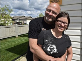 Rene Belzile and wife Valerie Laprise came home to collect a few items and are leaving to Calgary to stay for a while on day three of the re-entry into Fort McMurray, June 3, 2016.