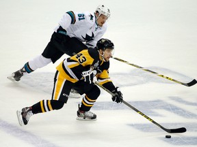 Penguins forward Conor Sheary skates past Sharks defenceman Justin Braun during Game 2 of the Stanley Cup final in Pittsburgh on Wednesday, June 1, 2016. (Gene J. Puskar/AP Photo)