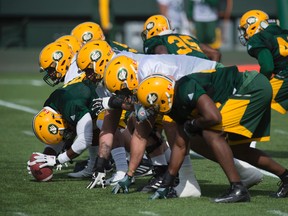 The special teams unit set up for a field goal during Edmonton Eskimos training camp at Commonwealth Stadium this week. The entire offensive line is back this season for the Eskimos.